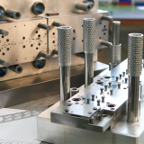 Mecanor SA  -  Stanztechnik Umformtechnik Serieteile für die Uhrenindustrie Serieteile für die Medizinaltechnik Prototypen - Mecanor SA