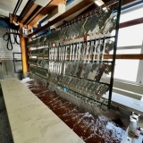 Schild Metallveredlung AG  -  Metall Galvanische Verzinkung Chromstahl-Behandlung Verzinken Elektropolieren  - Gestellautomat